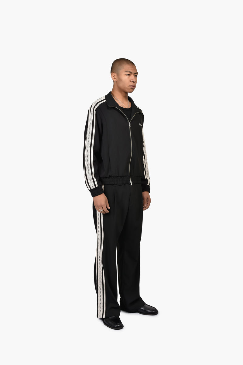 ELEVATED TRACK TOP